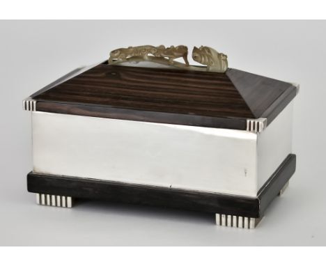 An Early 20th Century Silver and Coromandel Rectangular Box, by Puiforcat of Paris, of Art Deco design, the angled cover inse