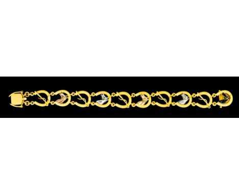 An Unusual Custom-Made Bracelet, depicting horseshoes and riding crops, alternate links set with enamel depiction of differen