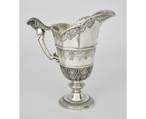 A French Silver Ewer, stamped T Fres possibly for Tetard Freres, and 950 Standard, of octagonal panelled form chased and cast