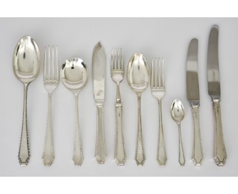 An Elizabeth II Silver Gadroon Pattern Part Table Service by Garrard &amp; Co. Ltd, Sheffield 1984, comprising: - eight table