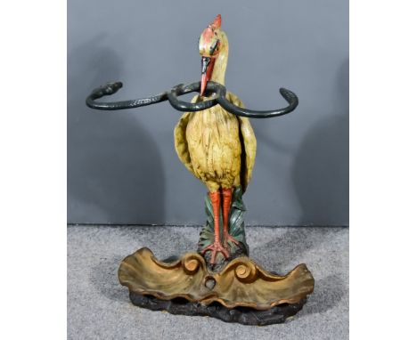A Victorian Cold Painted Cast Iron Stick Stand in the Coalbrookdale Manner, modelled as a heron holding a coiled serpent with