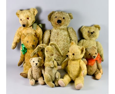 A Selection of Vintage Soft Toys, comprising: - a Farnell 'Wilfred' mohair rabbit 10ins high to top of head, a large golden m