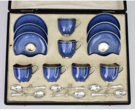A Royal Worcester Bone China and Silver Coffee Set and a Plated Serving Set, the coffee set with six powder blue and silver g