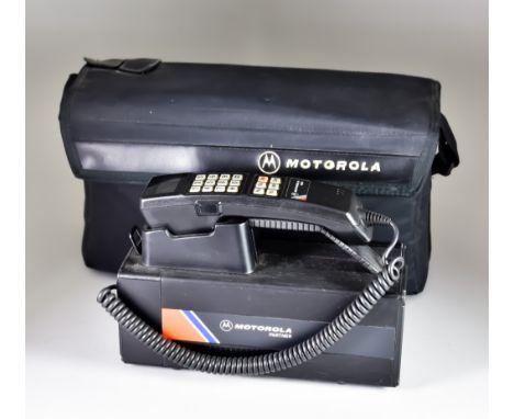A Motorola 5000X Mobile Phone, 1980s period mobile phone, contained in original bag with shoulder strap, aerial, instruction 