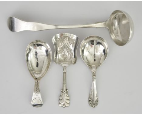 Three Silver Caddy Spoons and a Toddy Ladle, including a shovel pattern caddy spoon by Hilliard & Tomason Birmingham 1856, en