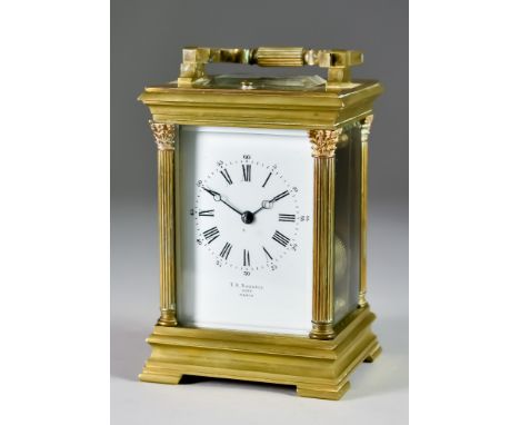 An Early 20th Century French Carriage Clock by T. R. Russell, 3157 Paris, the white enamel dial with Roman and Arabic numeral