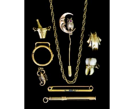 A Quantity of 9ct Gold Items, comprising - a rope twist chain, 840mm in length, one odd earring, a champagne bucket charm, a 