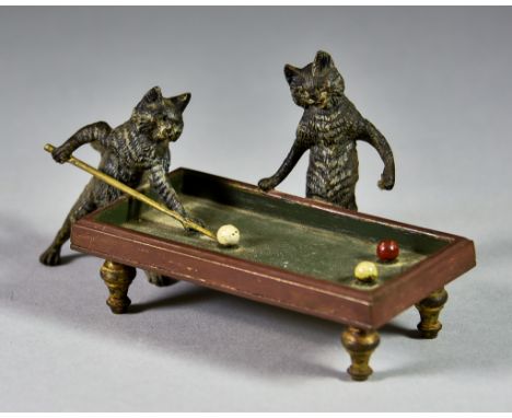 A Cold Painted Bronze Model of Two Cats Playing Snooker, in the style of Franz Bergman, 5ins long overall x 2.5ins high,&nbsp