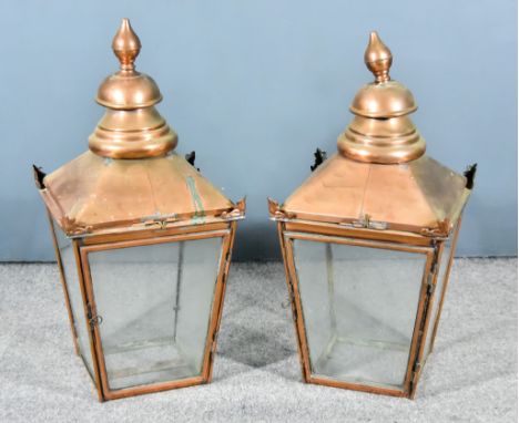 A Pair of Copper and Glass Lanterns, each surmounted by turned finial, fitted four angles glass panels, 15ins squared x 33ins