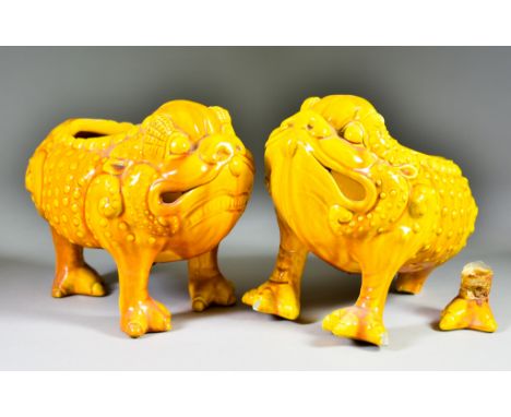A Near Pair of Burmantofts Faience Style Orange/Yellow Spoonwarmers in the Form of Grotesque Three-Legged Toads, Early 20th C