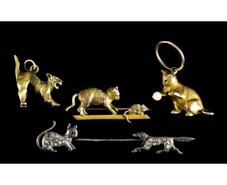 A Small Quantity of 9ct Gold Cat/Dog Related Items, comprising - a 9ct gold pendant of a cat playing with a ball in the form 