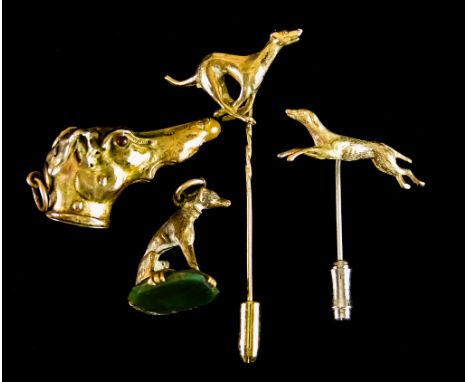 A Mixed Lot of Greyhound Related Items, comprising - two 9ct gold stick pins, total gross weight 6.3g, one sitting greyhound 