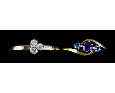Two 9ct Gold Gem Set Rings, comprising - one with three small brilliant cut diamonds, the other with an amethyst flanked eith