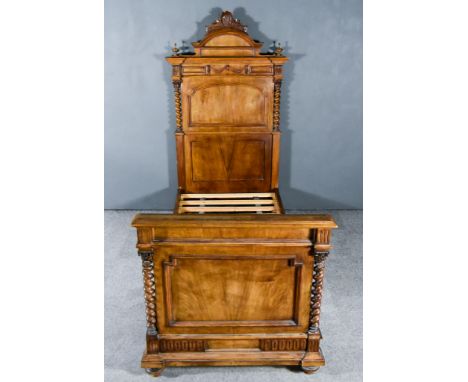 A Continental 19th Century Walnut 3ft Bedstead, the head board with arched and moulded top with shell and scroll cresting, ar