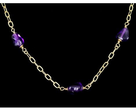 A 9ct Gold Amethyst Necklace, set with tumbled natural amethyst stones interspaced by chain links, 560mm in length, total gro