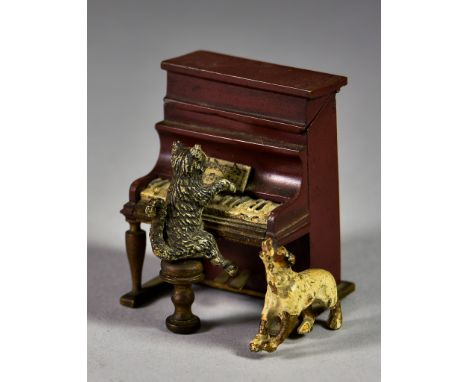 An Austrian Cold Painted Bronze Match Holder, in the form of a cat playing the piano watched by a dog, 2.25ins high, unmarked
