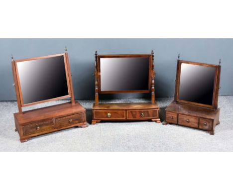 Three 19th Century Mahogany Rectangular Toilet Mirrors, one inlaid with chequered stringings on turned uprights, the bow fron