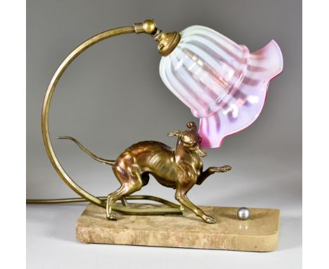 A Bronze Spelter and Marble Electric Table Lamp in the form of a greyhound playing with a silver ball with C-scroll branch an