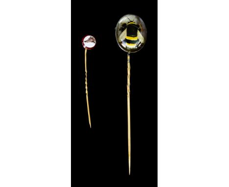 Two Stick Pins, comprising - one in the form of an enclosed bee on yellow metal pin (tests as 14ct gold), 90mm in length, and