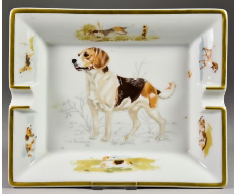 A Hermes Porcelain Rectangular Ashtray, decorated with beagles, designed by Carl de Parcevaux, gilt edged, 6.25ins x 7.75ins