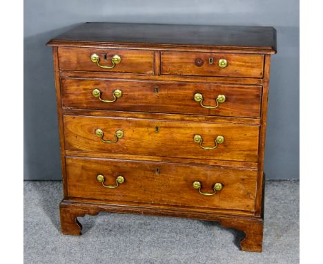 A George III Mahogany Chest with moulded edge to top, fitted two short and three long graduated drawers on bracket feet 34ins