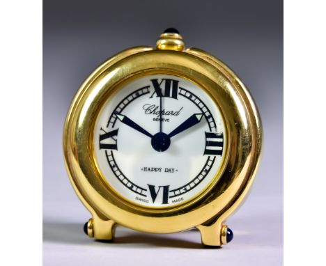 A Swiss Chopard Gilt Metal Cased "Happy Day" Travel Alarm Clock,&nbsp;the white dial with Roman numerals to 3, 6, 9 and 12, c