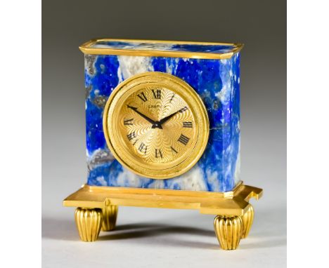 A 20th Century French 18ct Gold Mounted and Lapis Lazuli Desk or Mantel Timepiece by Cartier, the 1.25ins diameter dial with 