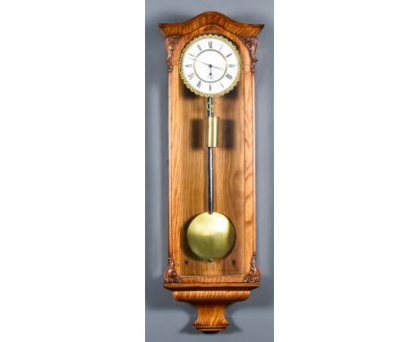 An Early 20th Century Stained Wood Cased Vienna Regulator, the 6.5ins white enamel dial with Roman numerals to the single tra