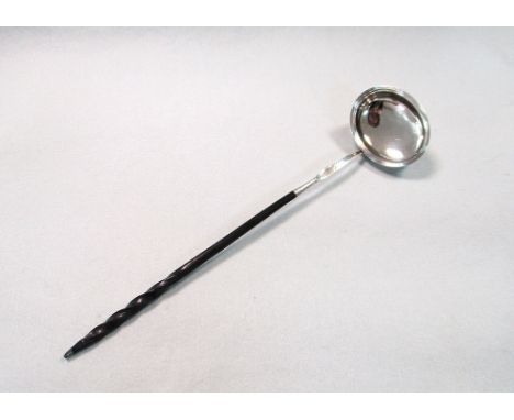 A George III silver punch ladle by the Batemans, Peter, Ann and William, London 1804, the bowl of simple oval form with reede