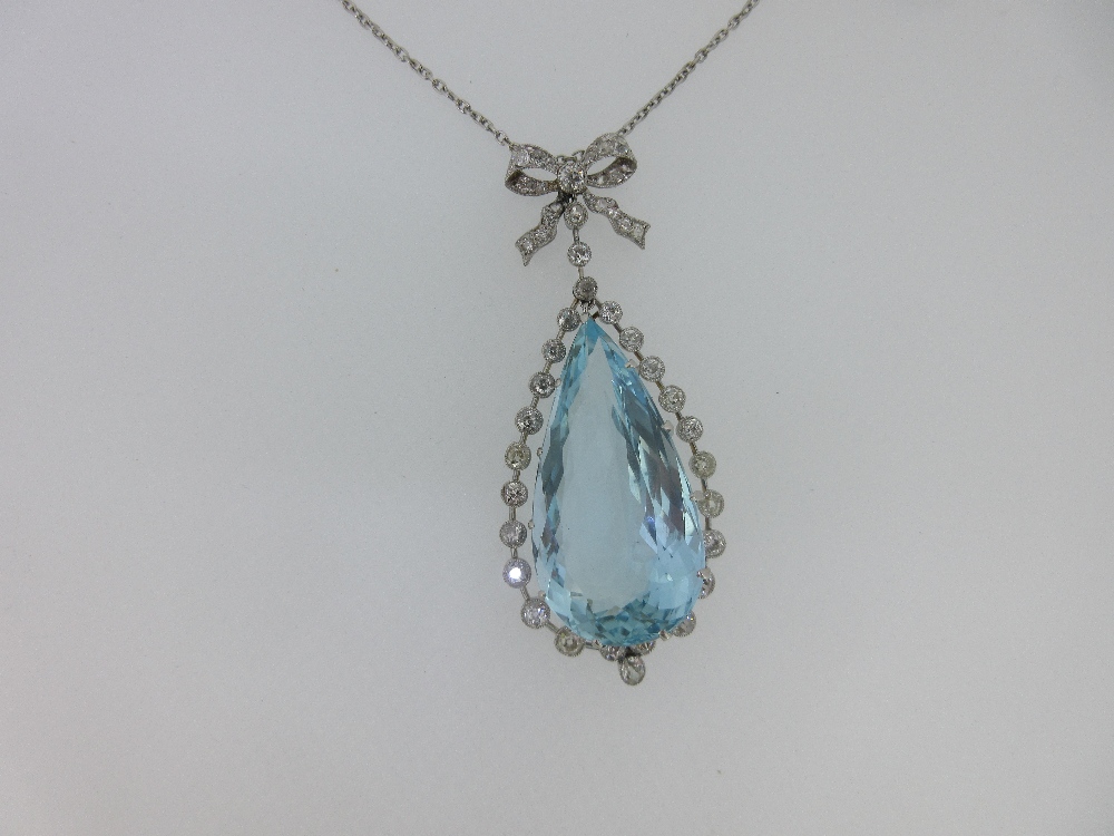 A Belle Époque diamond and aquamarine pendant necklace, the pear shaped