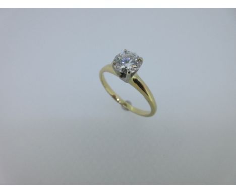 A single stone diamond ring, the round brilliant cut diamond, estimated weight 0.80ct, in a four claw Tiffany style setting, 