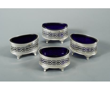 A set of four Victorian silver open salts, by Edward and Noble Haseler, London 1899, of boat shaped form with a band of pierc