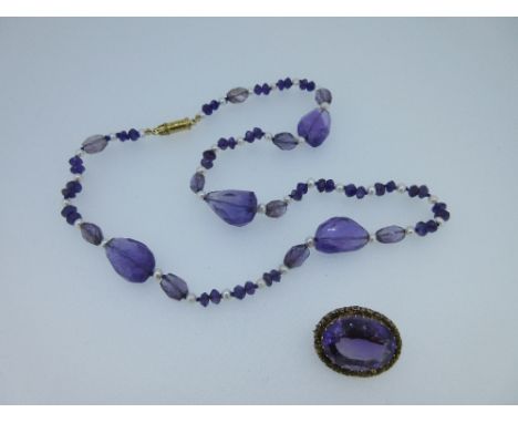 An amethyst and seed pearl necklace with removable Victorian amethyst centrepiece, the necklace composed of facetted amethyst