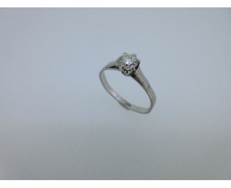 A single stone diamond ring, the round brilliant cut diamond, estimated weight 0.40cts, six claw set to a plain uniform band 