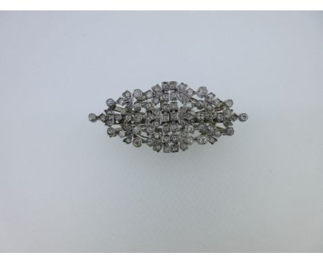 A diamond double clip brooch, of book-matched pierced and foliate design and navette shaped outline, set throughout with old 