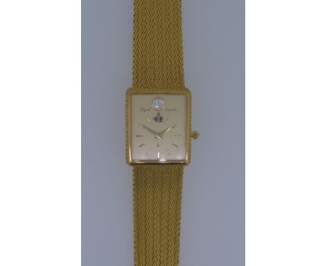 Loyal - A gentleman's 18ct gold and diamond set wristwatch, the signed rectangular champagne coloured dial with gold coloured