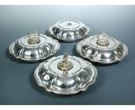 Four Victorian silver entrée dishes and covers, three bases possibly by Creswick &amp; Co, Sheffield 1872, engraved with the 