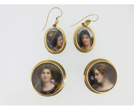 A pair of enamelled ceramic pendant earrings and a similar pair of lapel buttons, the earrings with oval porcelain plaques pa