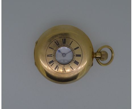 An unsigned continental gold half hunter pocket watch, the front lid with blue enamel Roman numerals, the white dial, 40mm di