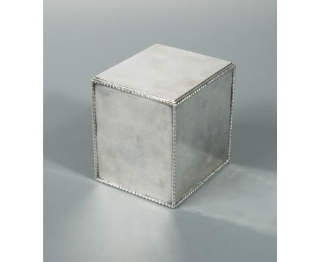 A George III silver tea caddy, by Thomas Hemming, London 1774, of very plain rectangular form with gadrooned edges, the flat 