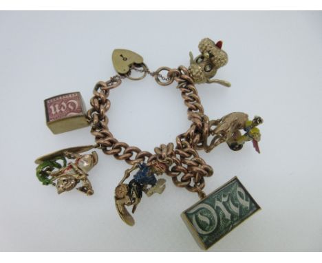 A 9ct gold charm bracelet with quirky and mainly hallmarked charms, the rose gold curb link bracelet, London hallmarks for 9c