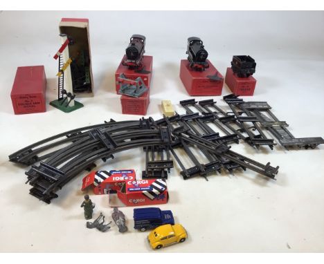 A quantity of Hornby 0 gauge clock work trains, tender, track and signal. Includes two 501 locomotives (reversing), No.50 ten