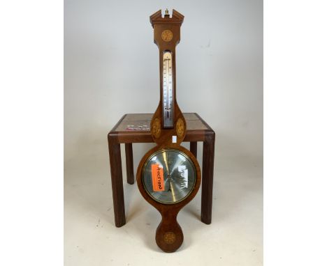 A modern inlaid barometer by Comitti Holborn also with a small tiled top G Plan style table. 