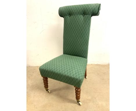 A Victorian prayer chair with graduated bobbin tuned front legs and ceramic castors.H:37cm