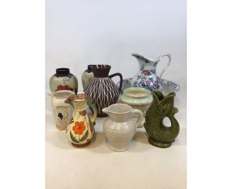 Jugs and vases including Clarice Cliff, Myott,, Dartmouth, Burleigh and others