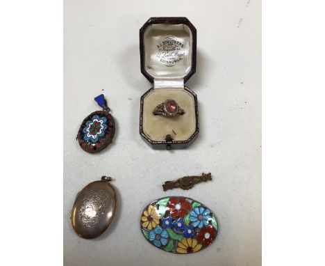 A vintage silver enamel brooch, a yellow metal locket, an enamelled locket, a yellow metal ring and a gold hall marked brooch