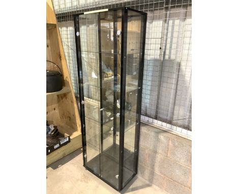 A modern glazed display cabinet with mirrored back and light. Four glass adjustable shelves and glass sides. W:58cm x D:32cm 