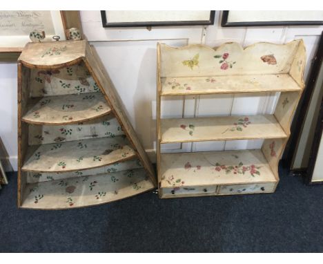 A white painted wall shelf, with two drawers and shelves, decorated with roses and butterflies 57cm and a triangular shaped w