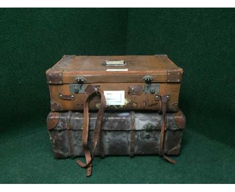 An early 20th century oak bound trunk and leather suitcase 