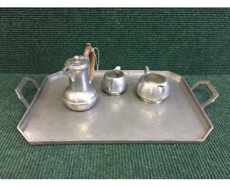An Old English pewter twin handled tray and three piece tea service 
